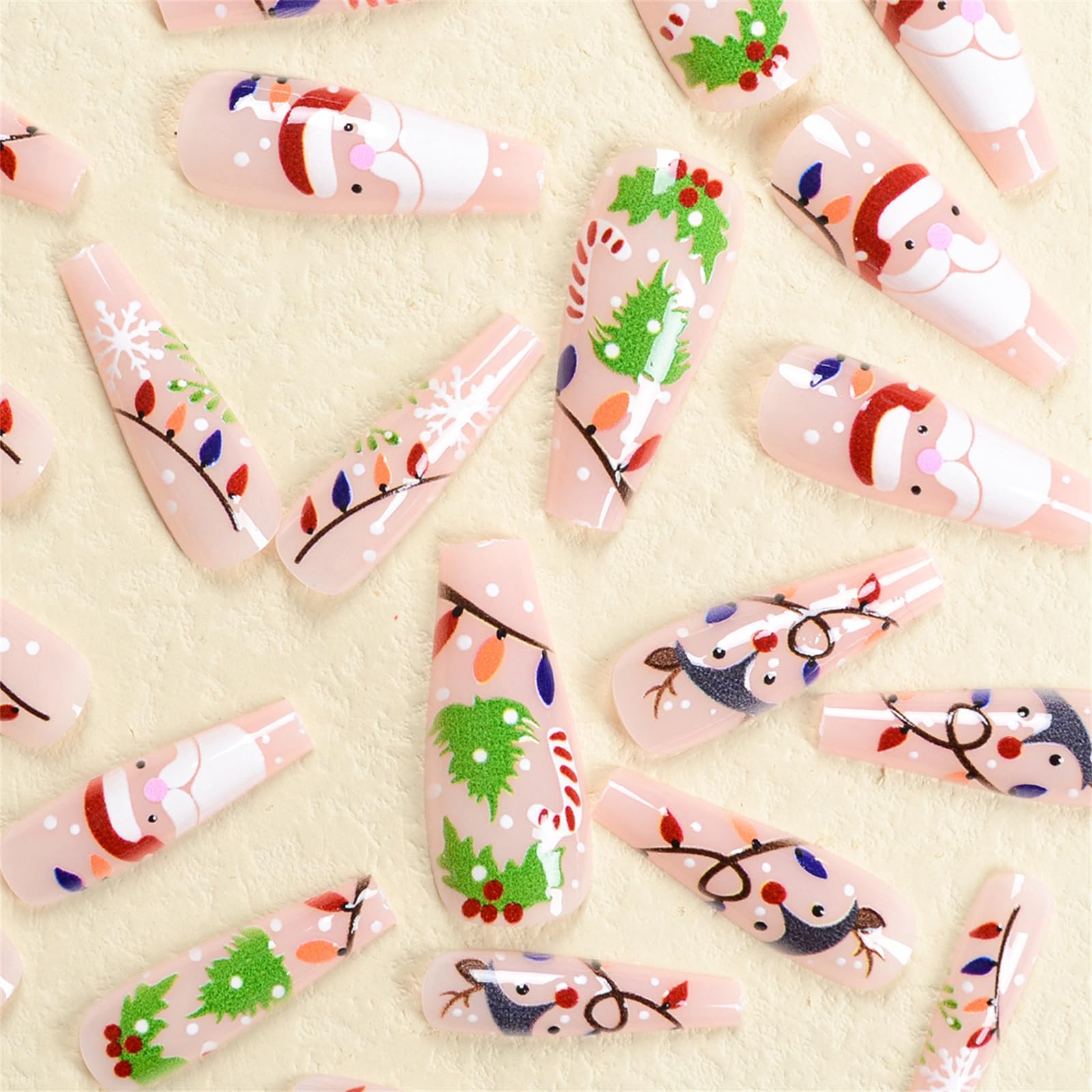 24 Pcs Christmas False Nails Long - Press on Nails with Santa Claus and Elk - Nude Pink Coffin Fake Nails Medium Length with Jelly Glue - Festival Holiday Nails Fake Nail for Nails Art