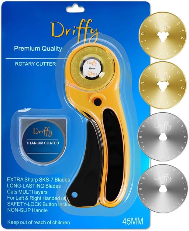The Driffy 45mm rotary cutter on its blue blister card with four spare blades, two gold titanium coated and two steel