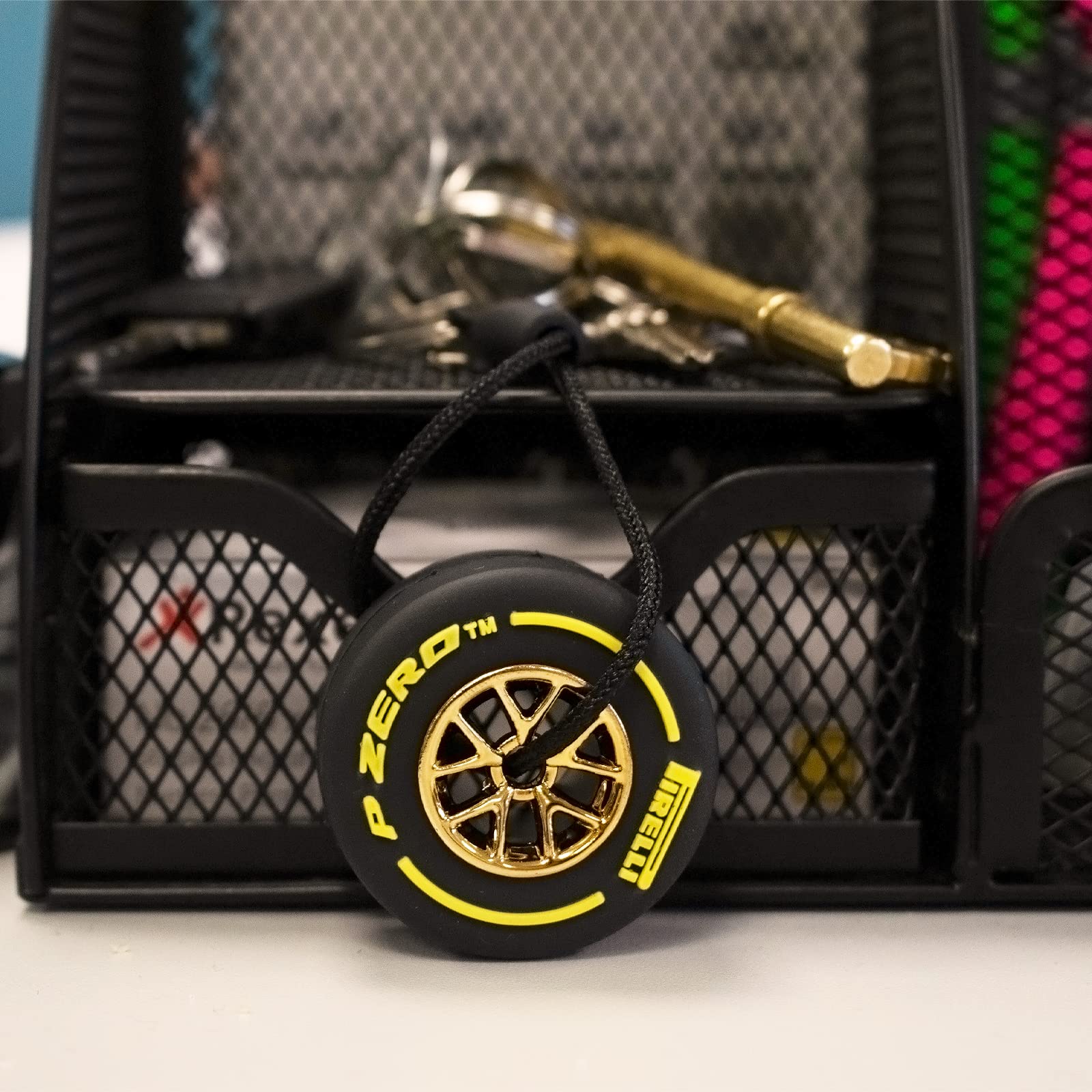 TRIXES Yellow Racing Car Wheel with Metal Hub Keyring – Small Keychain - Formula 1 Fan Merchandise - Gifts for Men – Rubber Tyre, Chain & Stainless-Steel Ring to Attach to your Keys Bag or Display