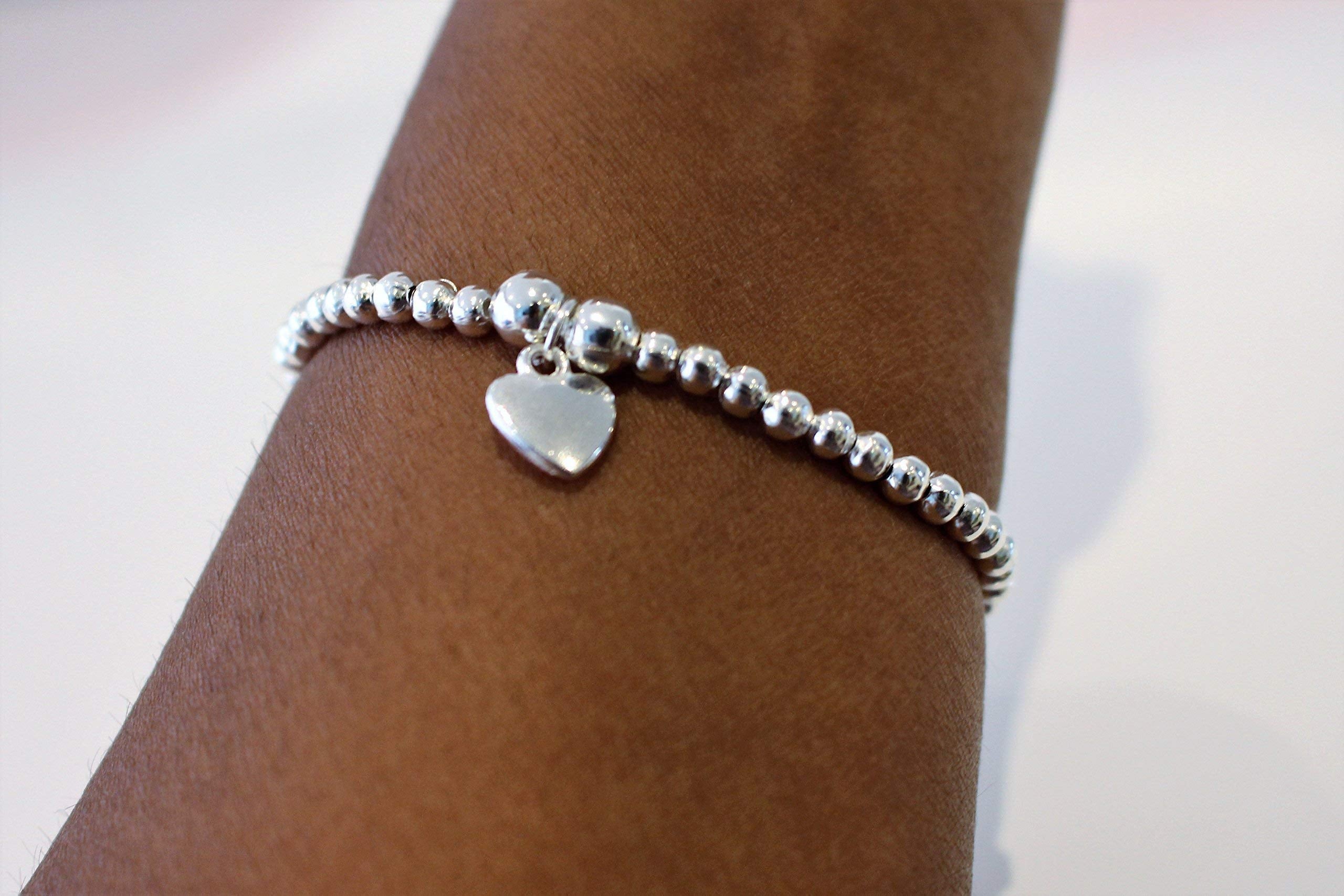 Silver Colour Round Beads With Heart Charm Stretchable Bracelet