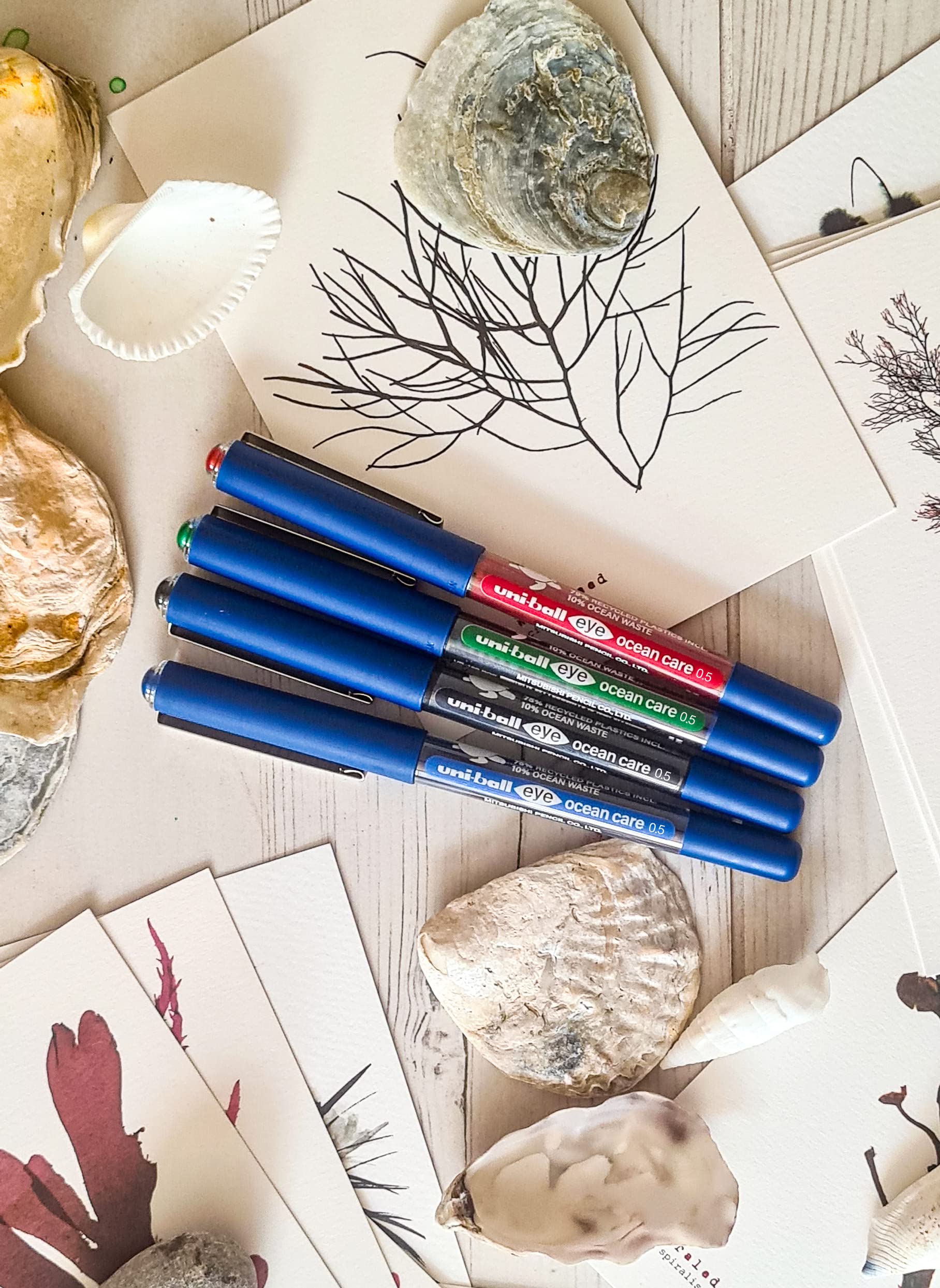 uni-ball Eye Ocean Care UB-150ROP Red Rollerball Pens. Fine 0.7mm Ballpoint Tip for Super Smooth Writing, Drawing, Art, Crafts and Colouring. Fade and Water Resistant Liquid Uni Super Ink. 12 Pack