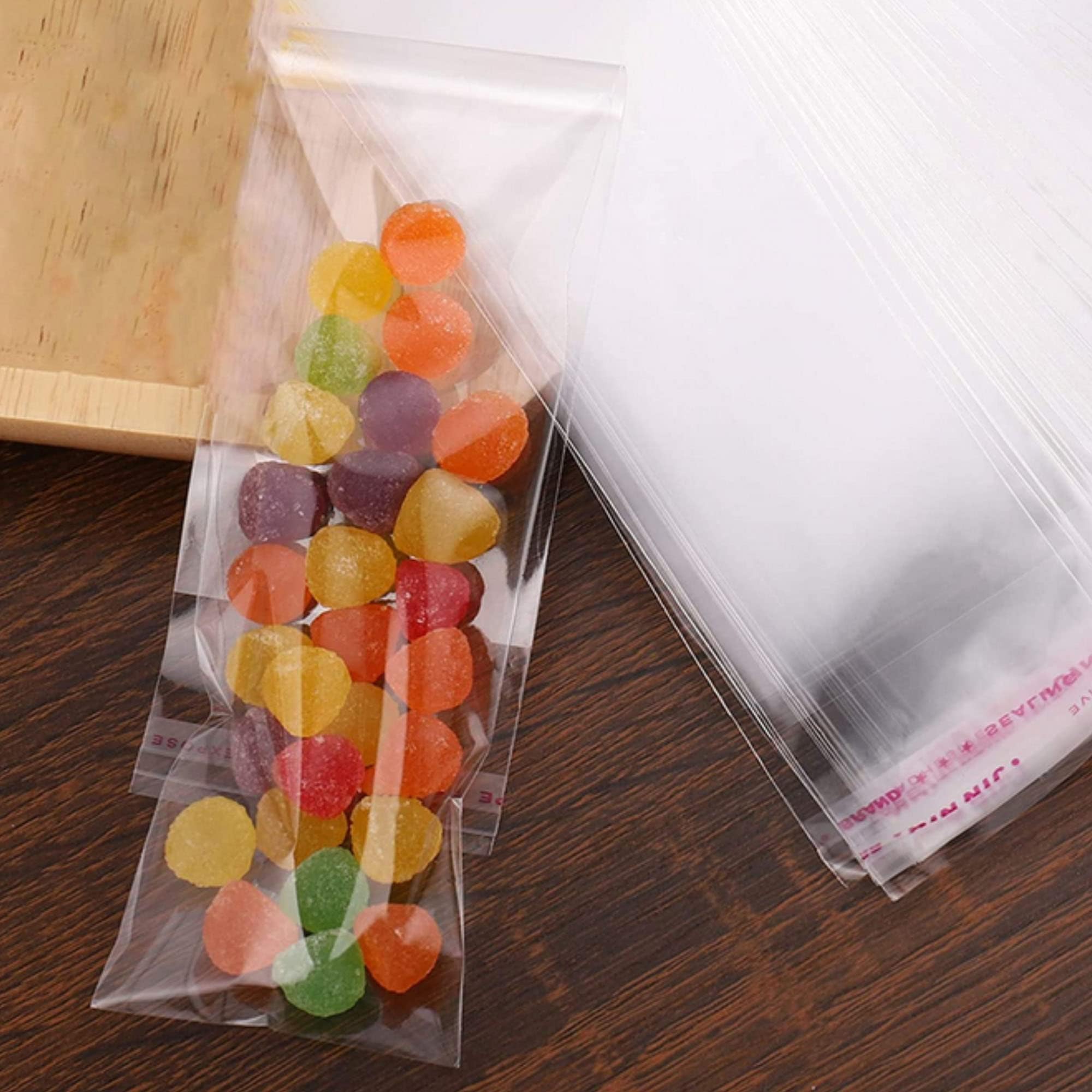 Adhesive Cellophane Bags Long 100pcs 2x6 inches Clear Self-adhesive Cello Bags 50µm Self Sealing OPP Plastic Bags for Candy Crayon Oil Pastel Key Chain Watch Hairpin Necklace