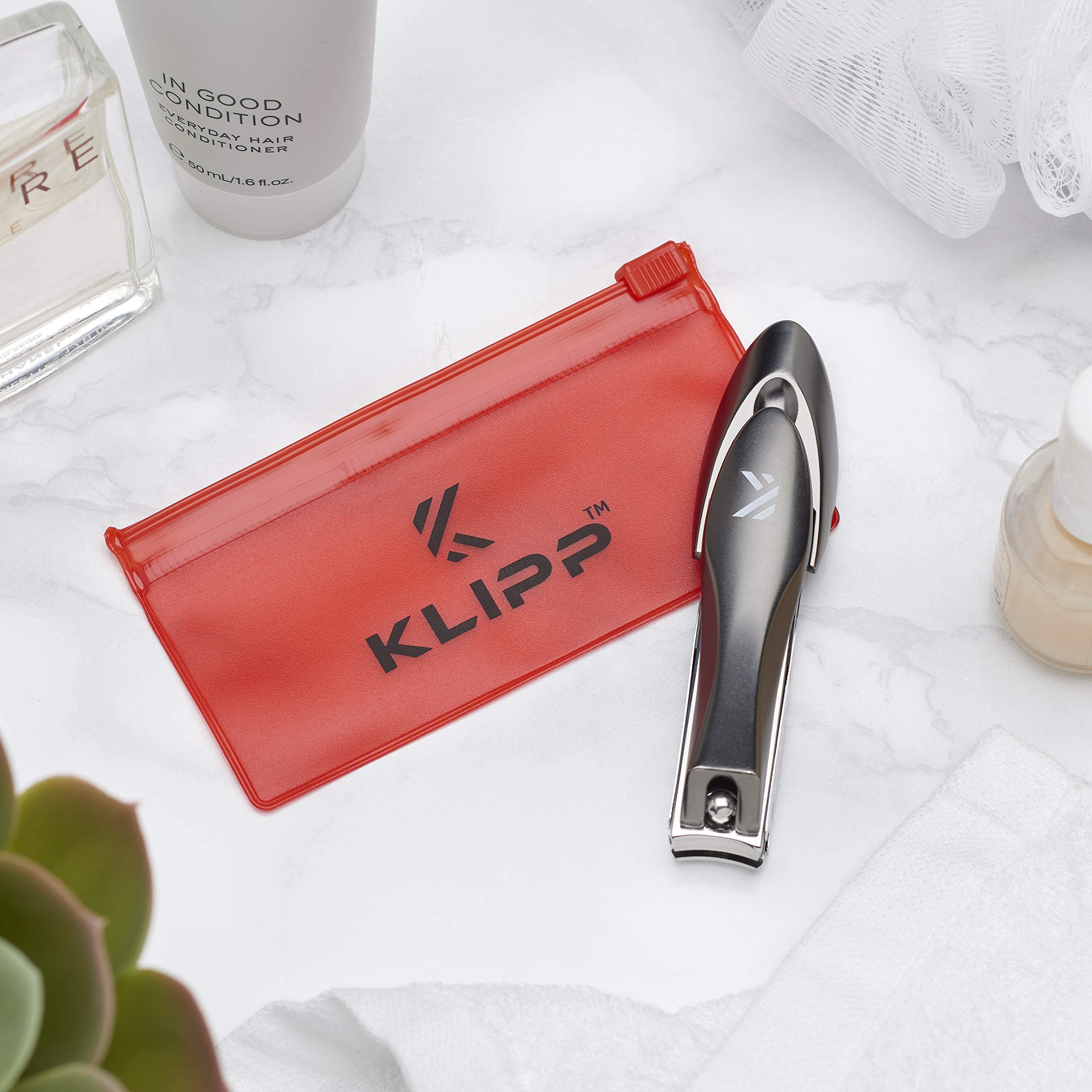 KLIPP Nail Clippers with Catcher – Heavy Duty Stainless Steel Fingernail and Toe Nail Cutter with Curved Surgical Blades and Built-in Nail File – Ergonomic Handle with Wide Jaws for Thick Nails